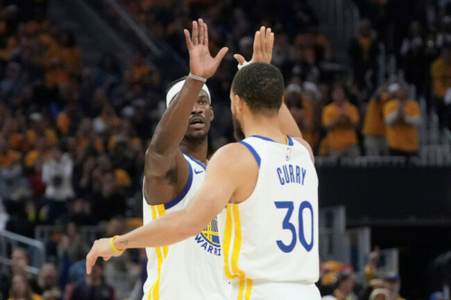golden-state-warriors-forward-jimmy-butler-iii-left-celebrates-with-guard-stephen-curry-30-during-the-first-half-of-an-nba-play-in-tournament-basketball-game-against-the-memphis-grizzlies-in-san-f
