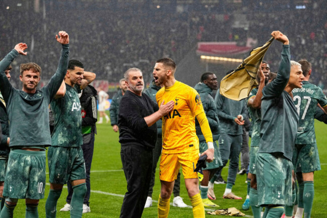 tottenhams-head-coach-ange-postecoglou-centre-celebrates-with-his-players-at-the-end-of-the-europa-league-quarterfinal-second-leg-soccer-match-between-eintracht-frankfurt-and-tottenham-hotspur-in
