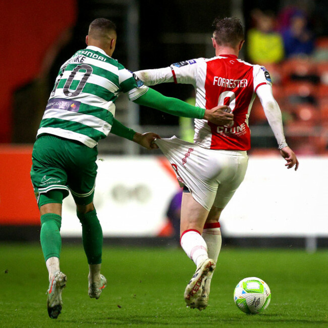 graham-burke-grabs-hold-of-chris-forrester