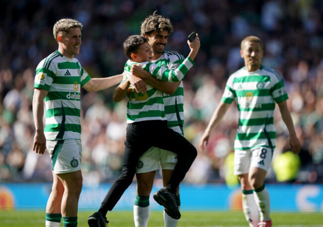 celtics-jota-centre-celebrates-with-a-young-pitch-invader-after-scoring-his-sides-fifth-goal-during-the-scottish-gas-mens-scottish-cup-semi-final-match-at-hampden-park-glasgow-picture-date-sund