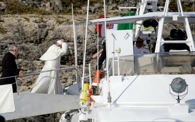 pope-francis-boards-an-italian-coast-guard-boat-upon-his-arrival-at-the-island-of-lampedusa-southern-italy-monday-july-8-2013-pope-francis-heads-monday-to-the-sicilian-island-of-lampedusa-for-his