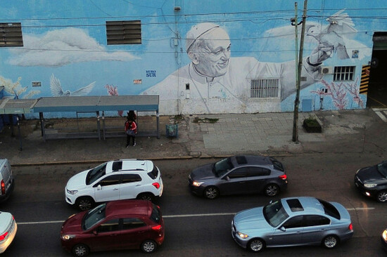 vehicles-drive-past-a-mural-of-the-late-pope-francis-in-buenos-aires-in-buenos-aires-argentina-monday-april-21-2025-ap-photomario-de-fina