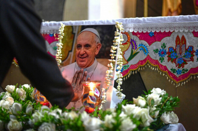 an-indian-catholic-nun-touches-a-portrait-of-pope-francis-after-a-prayer-meeting-in-kochi-india-monday-april-21-2025-following-the-announcement-of-his-death-by-the-vatican-ap-photor-s-iyer
