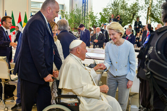 apulia-italy-14th-june-2024-european-commission-president-ursula-von-der-leyen-right-greets-pope-francis-before-a-special-session-of-the-g7-summit-at-the-borgo-egnazia-resort-june-14-2024-in