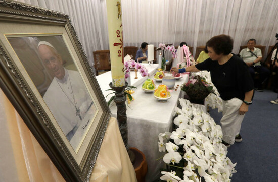 taiwanese-people-pay-their-respects-in-front-of-a-portrait-of-pope-francis-in-taipei-taiwan-tuesday-april-22-2025-ap-photochiang-ying-ying
