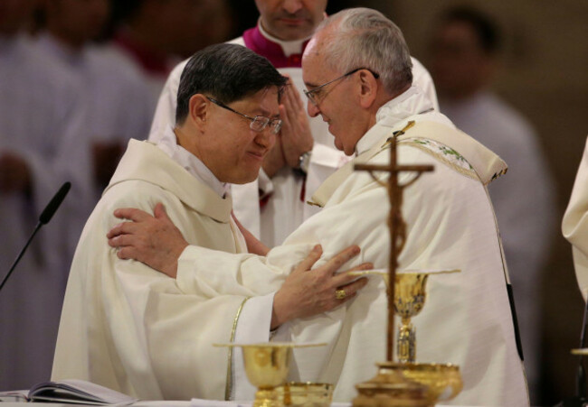 pope-francis-right-smiles-with-cardinal-luis-antonio-tagle-archbishop-of-manila-during-ceremonies-at-a-mass-at-cathedral-basilica-of-the-immaculate-conception-in-manila-philippines-friday-jan