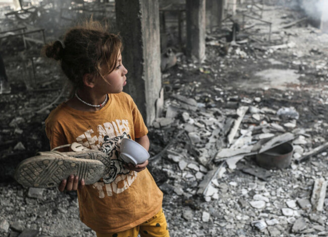 gaza-city-april-23-2025-gaza-city-the-gaza-strip-palestine-palestinians-inspect-the-damage-after-an-israeli-strike-on-a-school-housing-displaced-palestinians-in-gaza-city-on-april-23-2025-isra
