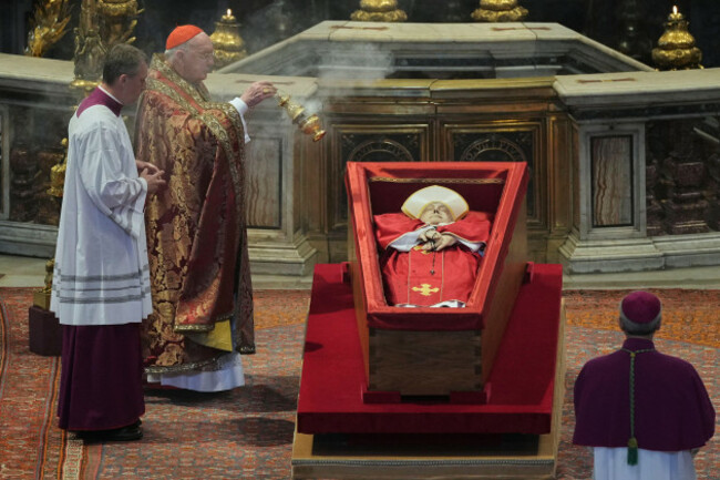 cardinal-camerlengo-kevin-joseph-farrell-asperges-incense-around-the-body-of-pope-francis-inside-st-peters-basilica-at-the-vatican-wednesday-april-23-2025-where-he-will-lie-in-state-for-three-da