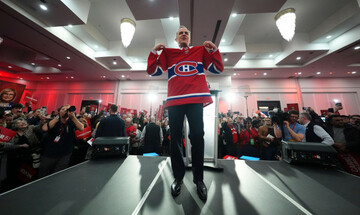 liberal-leader-prime-minister-mark-carney-holds-a-rally-in-laval-quebec-tuesday-april-22-2025-sean-kilpatrickthe-canadian-press-via-ap