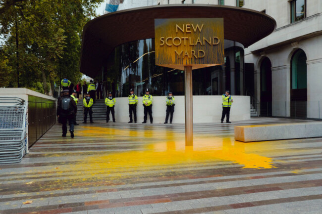 london-uk-14-oct-2022-just-stop-oil-activists-spray-paint-new-scotland-yard