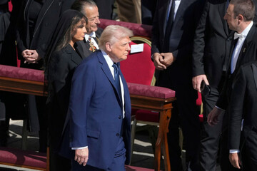president-donald-trump-and-first-lady-melania-trump-arrive-for-the-funeral-of-pope-francis-in-st-peters-square-at-the-vatican-saturday-april-26-2025-ap-photomarkus-schreiber