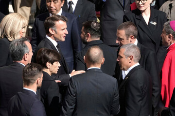 french-president-emmanuel-macron-center-left-speaks-with-ukraines-president-volodymr-zelenskyy-center-right-as-they-arrive-for-the-funeral-of-pope-francis-in-st-peters-square-at-the-vatican-sa