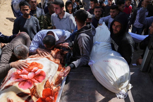 palestinians-mourn-over-the-bodies-of-their-relatives-who-were-killed-in-an-israeli-airstrike-as-they-brought-to-shifa-hospital-in-gaza-city-on-saturday-april-26-2025-ap-photojehad-alshrafi