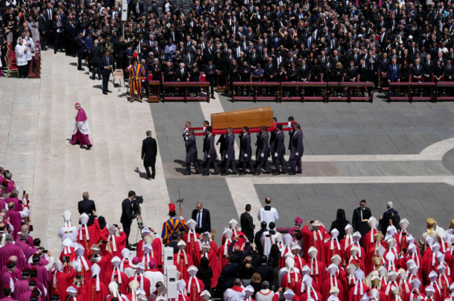 the-coffin-of-pope-francis-is-carried-at-the-end-of-his-funeral-in-st-peters-square-at-the-vatican-saturday-april-26-2025-ap-photogregorio-borgia