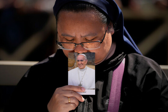 a-nun-holds-a-phot-of-pope-francis-while-attending-his-funeral-in-st-peters-square-at-the-vatican-saturday-april-26-2025-ap-photoandreea-alexandru
