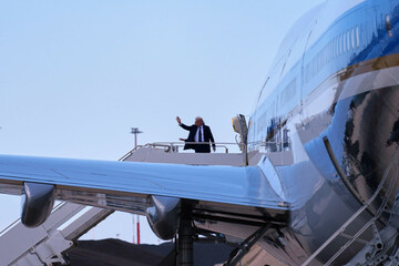 president-donald-trump-and-first-lady-melania-trump-wave-before-they-board-air-force-one-at-leonardo-da-vinci-international-airport-saturday-april-26-2025-in-rome-after-attending-the-funeral-of-p