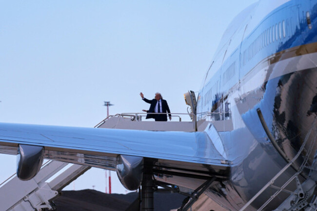 president-donald-trump-and-first-lady-melania-trump-wave-before-they-board-air-force-one-at-leonardo-da-vinci-international-airport-saturday-april-26-2025-in-rome-after-attending-the-funeral-of-p