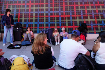 passengers-sit-outside-lisbon-airport-during-a-nationwide-power-outage-in-lisbon-monday-april-28-2025-ap-photoarmando-franca
