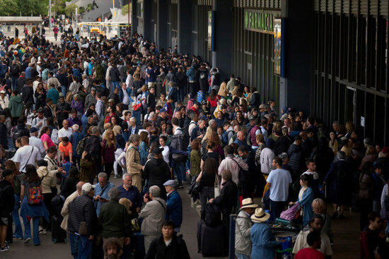 people-wait-outside-a-closed-train-station-during-a-major-power-outage-in-barcelona-spain-monday-april-28-2025-ap-photoemilio-morenatti