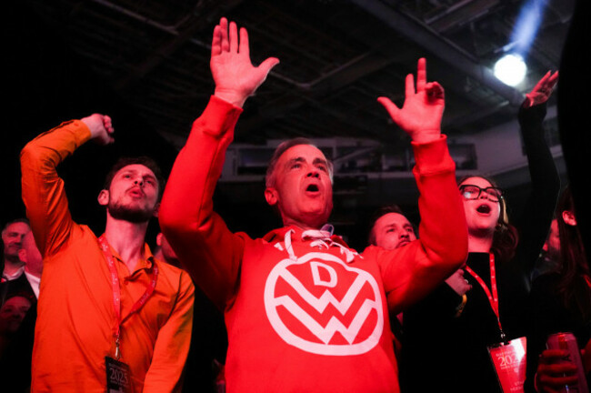 canadian-prime-minister-mark-carney-dances-to-canadian-band-down-with-webster-as-they-play-live-at-campaign-headquarters-after-the-liberal-party-won-the-canadian-election-in-ottawa-on-tuesday-april-2