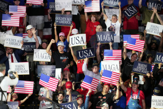 people-arrive-before-president-donald-trump-speaks-on-his-first-100-days-at-macomb-county-community-college-sports-expo-center-tuesday-april-29-2025-in-warren-mich-ap-photopaul-sancya