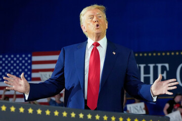 president-donald-trump-arrives-to-speak-on-his-first-100-days-at-macomb-county-community-college-sports-expo-center-tuesday-april-29-2025-in-warren-mich-ap-photoalex-brandon