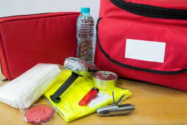 emergency-kit-for-survival-in-case-of-disaster-including-water-first-aid-kit-lighter-bags-utility-knife-and-others