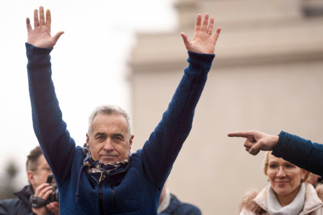 file-calin-georgescu-the-winner-of-the-first-round-of-presidential-elections-later-annulled-by-the-constitutional-court-waves-to-supporters-during-a-protest-in-bucharest-romania-march-1-2025