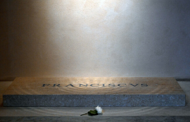 a-white-rose-lays-on-the-tomb-of-pope-francis-on-the-first-day-of-its-opening-to-the-public-in-santa-maria-maggiore-basilica-in-rome-italy-on-april-27-2025-pope-francis-1936-2025-wrote-in-his-tes