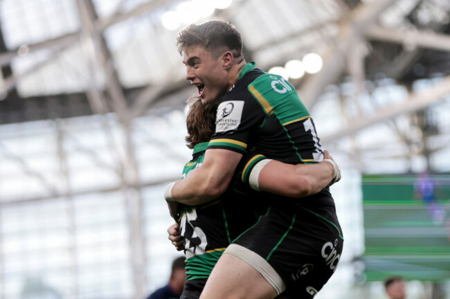 james-ramm-celebrates-scoring-a-try-with-tommy-freeman
