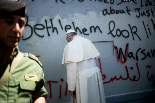 pope-francis-prays-at-israels-separation-barrier-on-his-way-to-a-mass-in-manger-square-next-to-the-church-of-the-nativity-traditionally-believed-to-be-the-birthplace-of-jesus-christ-in-the-west-ban