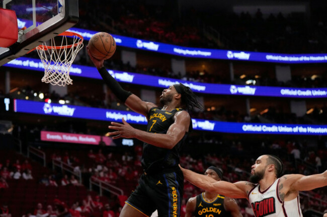 golden-state-warriors-buddy-hield-7-goes-up-for-a-shot-as-houston-rockets-dillon-brooks-defends-during-the-second-half-of-game-7-of-an-nba-basketball-first-round-playoff-series-sunday-may-4-2025
