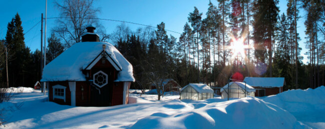 scandinavia-finland-finnish-sauna-cottage-in-snow