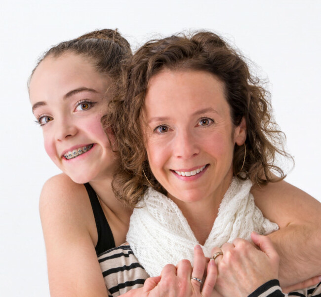studio-portrait-of-of-female-teenage-ballerina-dancer-with-her-mother