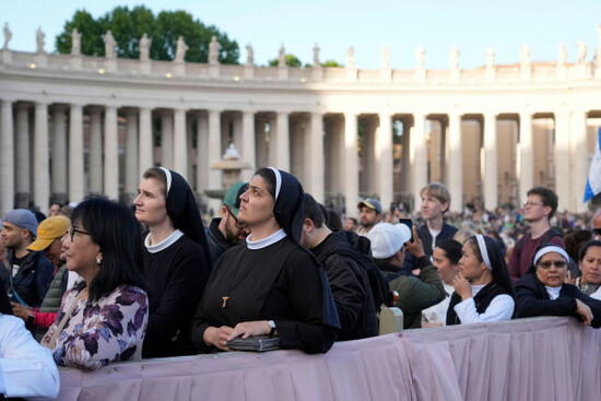 faithful-wait-in-st-peters-square-as-cardinals-are-gathered-in-the-sistine-chapel-for-the-conclave-at-the-vatican-wednesday-may-7-2025-ap-photogregorio-borgia