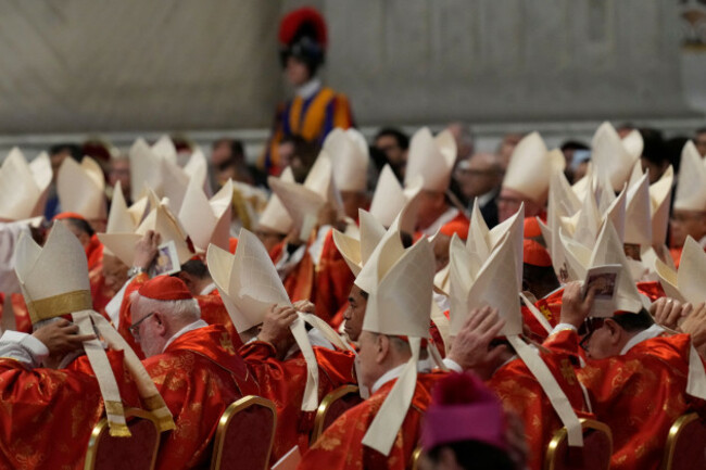 cardinals-adjust-their-mitre-hats-during-a-final-mass-celebrated-by-cardinals-inside-st-peters-basilica-before-the-conclave-to-elect-a-new-pope-at-the-vatican-wednesday-may-7-2025-ap-photogre
