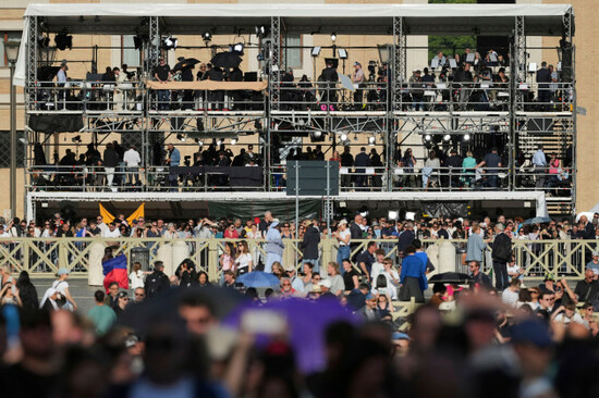 television-crews-working-at-st-peters-square-wait-to-see-smoke-pour-from-the-chimney-of-the-sistine-chapel-where-133-cardinals-are-gathering-on-the-second-day-of-the-conclave-to-elect-a-successor-to