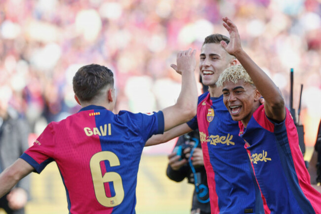 barcelona-players-celebrate-after-the-la-liga-soccer-match-between-barcelona-and-real-madrid-in-barcelona-spain-sunday-may-11-2025-ap-photojoan-monfort