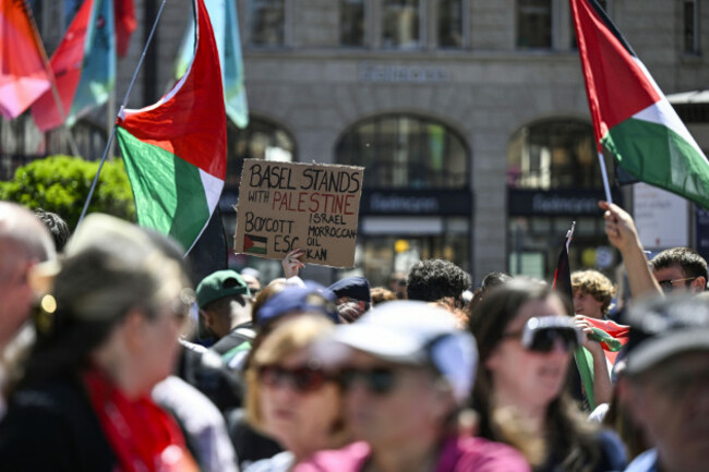 protesters-hold-palestinian-flags-and-a-pro-palestinian-sign-prior-to-the-opening-ceremony-of-the-69th-eurovision-song-contest-in-basel-switzerland-sunday-may-11-2025-peter-schneiderkeystone-v