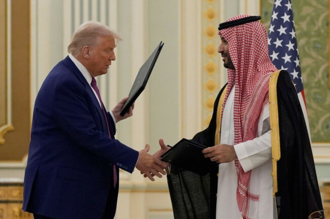 president-donald-trump-and-saudi-crown-prince-mohammed-bin-salman-shake-hands-after-exchanging-documents-during-a-signing-ceremony-at-the-royal-palace-in-riyadh-saudi-arabia-tuesday-may-13-2025