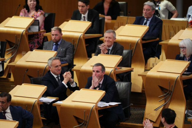 liberal-democrat-msp-liam-mcarthur-front-right-reacts-after-msps-approved-the-general-principles-of-legislation-which-could-introduce-assisted-dying-for-terminally-ill-scots-in-a-landmark-vote-in-th