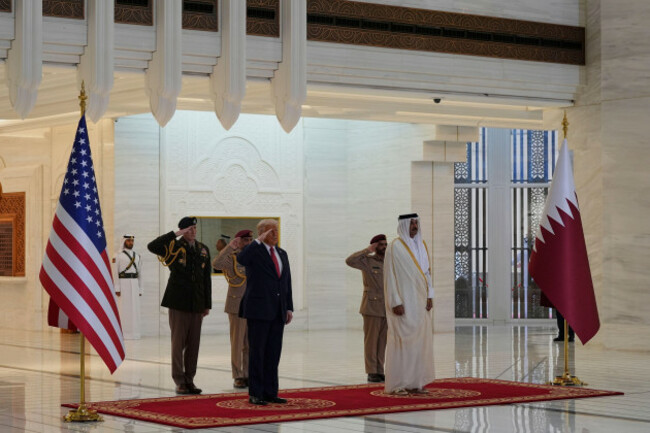 president-donald-trump-and-qatars-emir-sheikh-tamim-bin-hamad-al-thani-take-part-in-an-official-welcoming-ceremony-at-the-amiri-diwan-in-doha-qatar-wednesday-may-14-2025-ap-photoalex-brandon