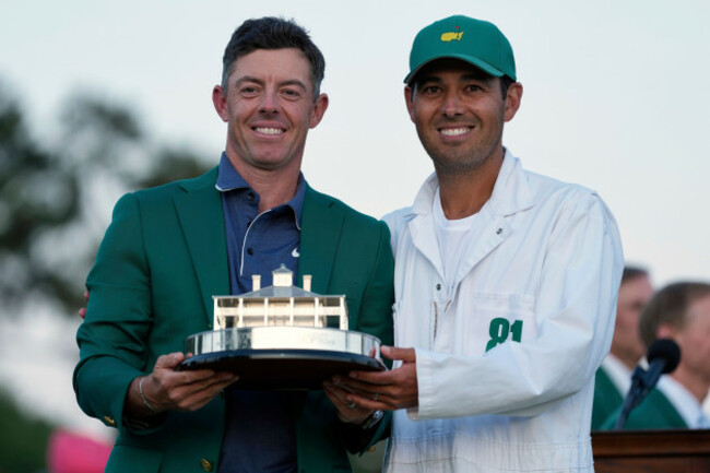 rory-mcilroy-of-northern-ireland-holds-the-trophy-with-caddie-harry-diamond-after-winning-the-masters-golf-tournament-sunday-april-13-2025-in-augusta-ga-ap-photoashley-landis
