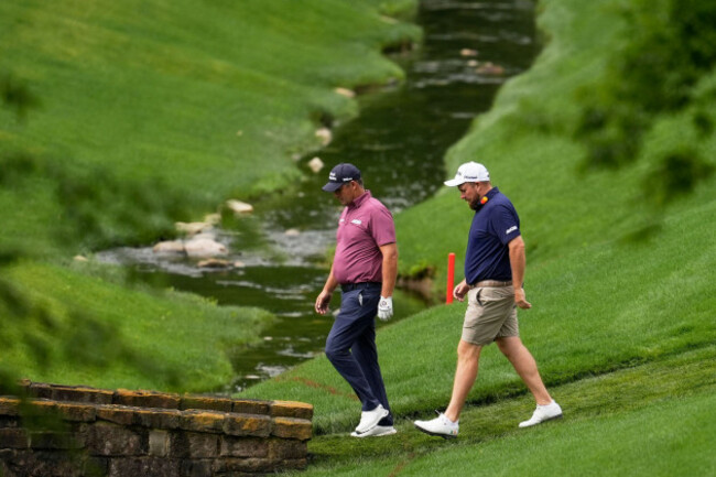 padraig-harrington-of-ireland-and-shane-lowry-walk-on-the-13th-hole-during-a-practice-round-for-the-pga-championship-golf-tournament-at-the-quail-hollow-club-wednesday-may-14-2025-in-charlotte