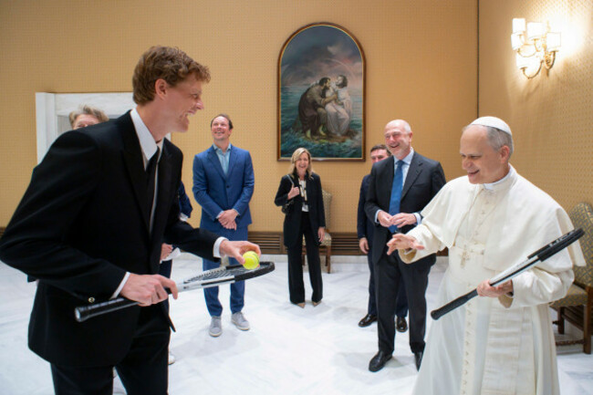 italys-jannik-sinner-left-shares-a-light-moment-with-pope-leo-xiv-on-the-occasion-of-their-meeting-at-the-vatican-wednesday-may-14-2025-vatican-media-via-ap