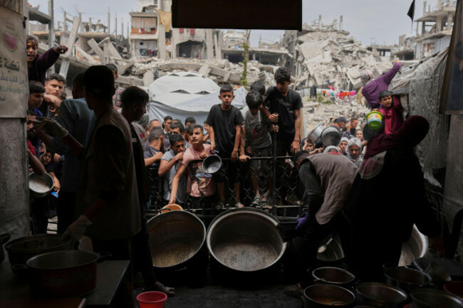 palestinians-struggle-to-get-donated-food-at-a-community-kitchen-in-jabalia-northern-gaza-strip-thursday-may-15-2025-ap-photojehad-alshrafi