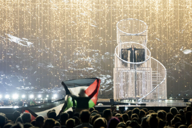 basel-a-visitor-holds-up-a-palestinian-flag-during-yuval-raphaels-performance-for-israel-during-the-final-rehearsal-for-the-second-semifinal-of-the-eurovision-song-contest-anp-sander-koning-nether