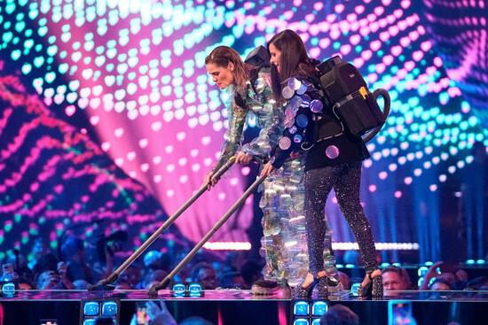 hosts-hazel-brugger-left-and-sandra-studer-help-the-clean-up-folowing-one-of-the-performers-during-the-dress-rehearsal-for-the-second-semi-final-of-the-69th-eurovision-song-contest-in-basel-switze
