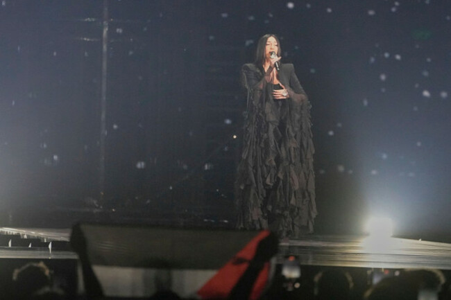a-palestinian-flag-is-raise-by-a-member-of-the-audience-as-yuval-raphael-from-israel-performs-the-song-new-day-will-rise-during-the-grand-final-of-the-69th-eurovision-song-contest-in-basel-switzer
