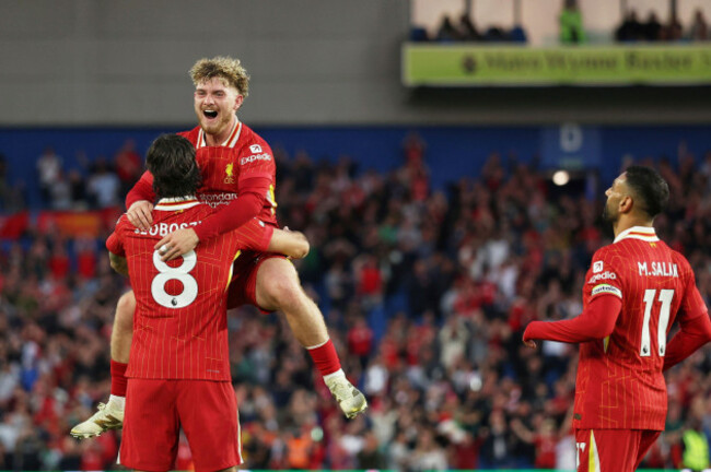 liverpools-dominik-szoboszlai-celebrates-with-liverpools-harvey-elliott-and-liverpools-mohamed-salah-right-after-scoring-his-sides-second-goal-during-the-english-premier-league-soccer-match-betw